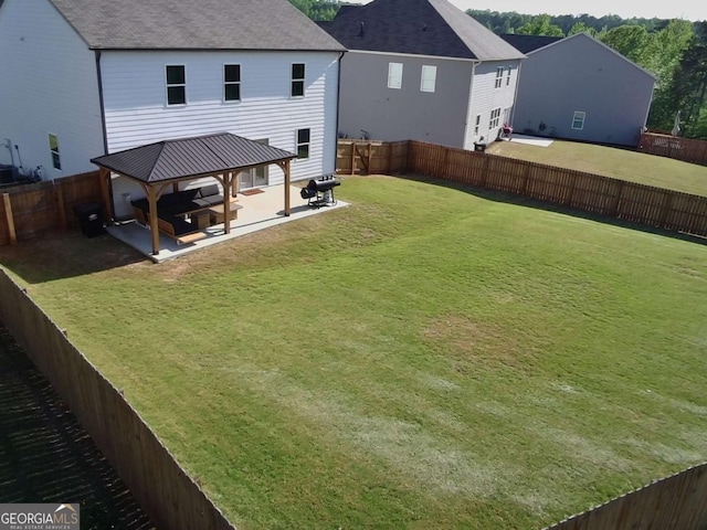 view of yard with a gazebo and a patio