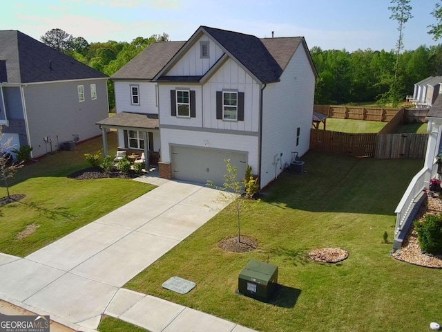 view of front of house featuring board and batten siding, driveway, an attached garage, a shingled roof, and central AC unit