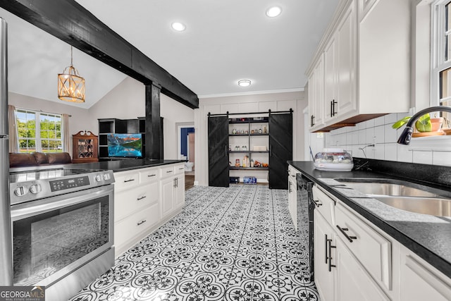 kitchen featuring stainless steel electric range oven, a sink, dark countertops, a barn door, and vaulted ceiling with beams