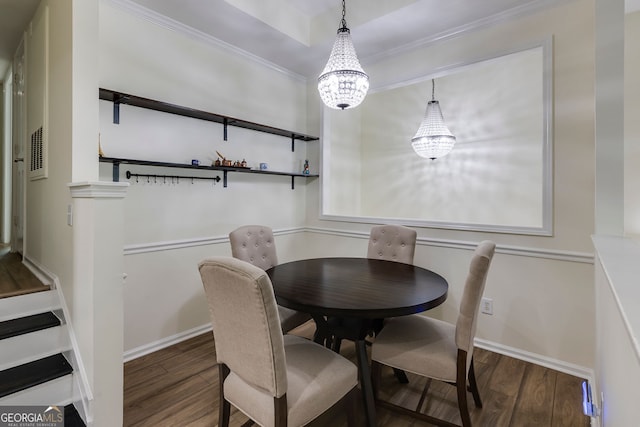 4246 River Green Dr Unit 202, Atlanta, GA 30327 - dining area with wood finished floors, a chandelier, and crown molding