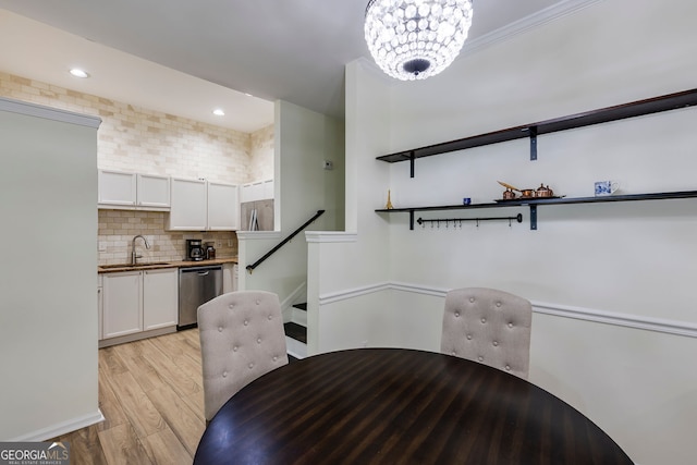 4246 River Green Dr Unit 202, Atlanta, GA 30327 - dining space featuring light wood-style floors, a chandelier, and recessed lighting