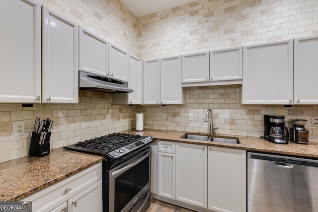 4246 River Green Dr Unit 202, Atlanta, GA 30327 - kitchen with stainless steel appliances, under cabinet range hood, and white cabinetry