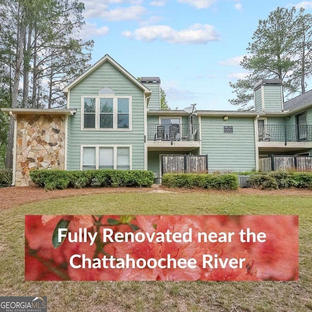 1206 Canyon Point Cir, Roswell, GA 30076 - view of front facade with stone siding and a front yard