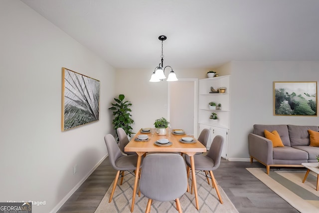 1206 Canyon Point Cir, Roswell, GA 30076 - dining area featuring wood finished floors, baseboards, and a chandelier