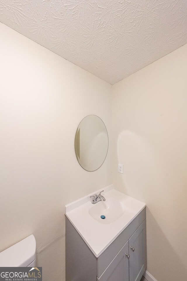 1206 Canyon Point Cir, Roswell, GA 30076 - bathroom with vanity and toilet