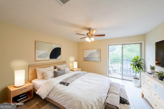 1206 Canyon Point Cir, Roswell, GA 30076 - bedroom featuring ceiling fan, access to outside, wood finished floors, and visible vents