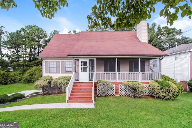 6024 S Deshon Ct, Lithonia, GA 30058 - view of front of house with a chimney, a front lawn, and roof with shingles
