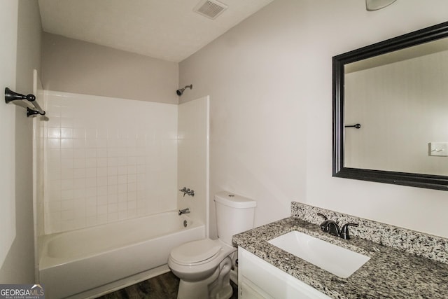 6024 S Deshon Ct, Lithonia, GA 30058 - full bath featuring vanity, shower / bath combination, and wood finished floors