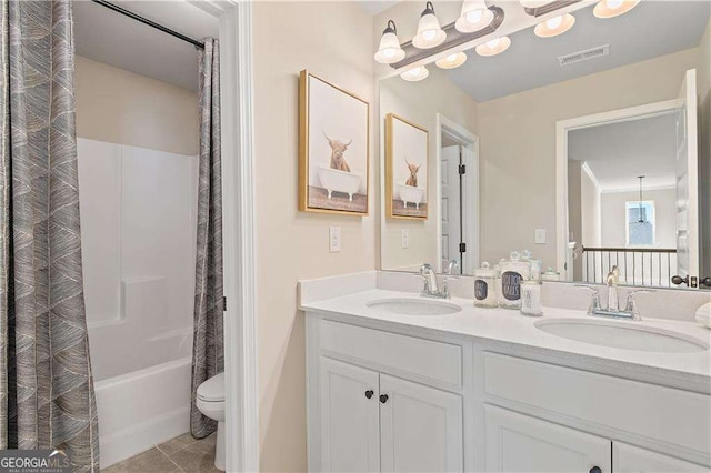 full bath featuring visible vents, tile patterned floors, toilet, and a sink
