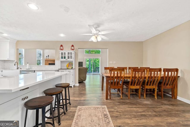 dining space with ceiling fan, baseboards, dark wood-style floors, and recessed lighting