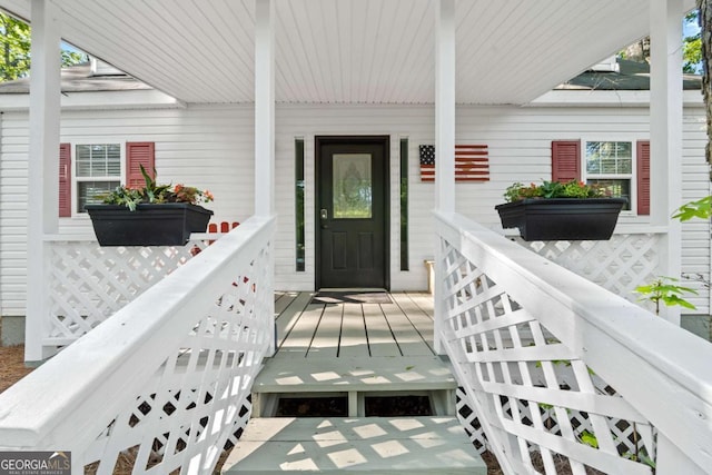 property entrance with a porch