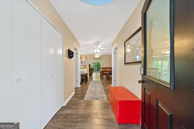 entryway featuring wood finished floors and ceiling fan