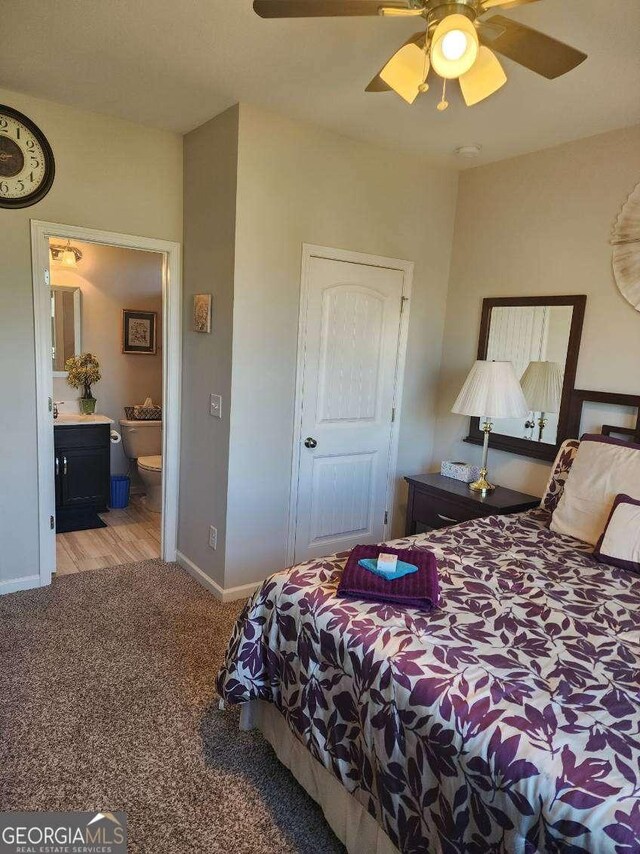134 Sierra Cir, Woodstock, GA 30188 - bedroom with baseboards, a ceiling fan, carpet flooring, and ensuite bathroom