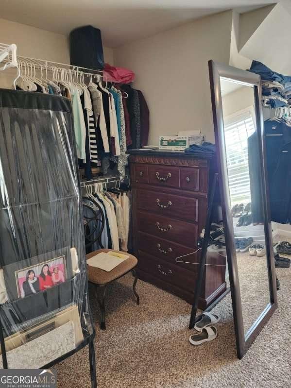 134 Sierra Cir, Woodstock, GA 30188 - walk in closet with carpet flooring