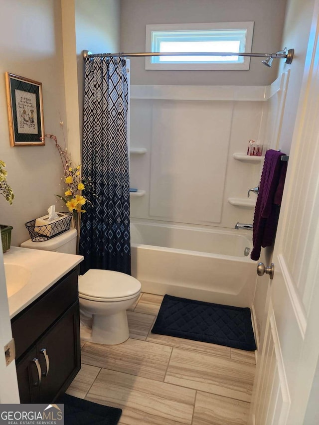 134 Sierra Cir, Woodstock, GA 30188 - full bathroom featuring toilet, vanity, and shower / bathtub combination with curtain