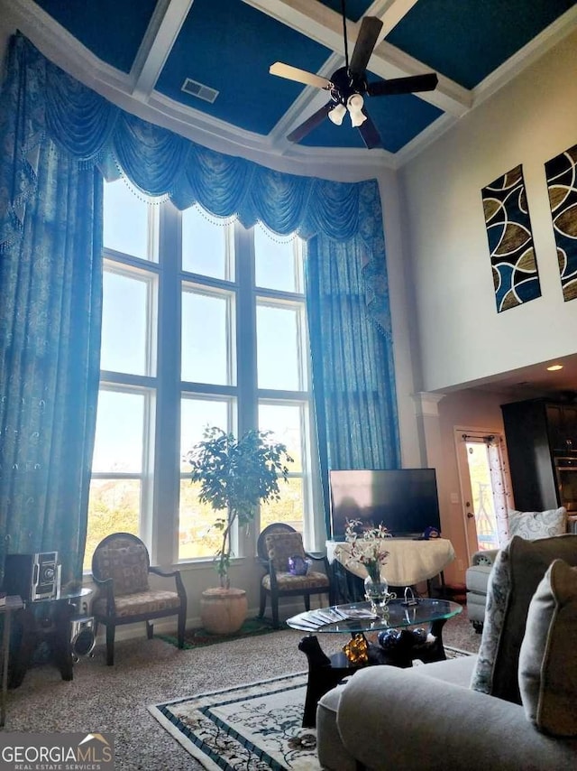 134 Sierra Cir, Woodstock, GA 30188 - living area with a ceiling fan, visible vents, a wealth of natural light, and coffered ceiling