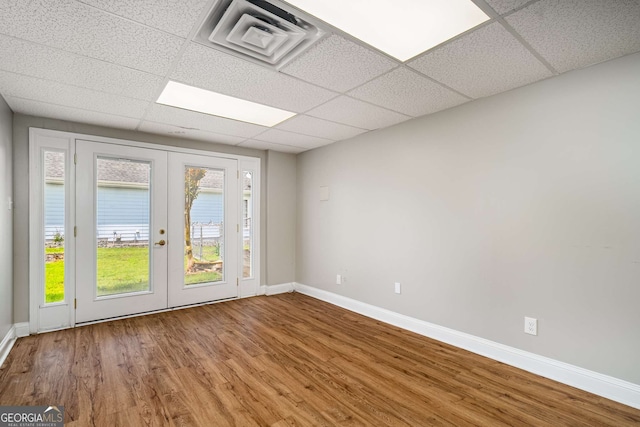 1320 Pinyon Pl, Lawrenceville, GA 30043 - unfurnished room with baseboards, a drop ceiling, french doors, and visible vents