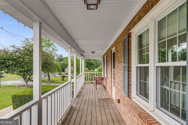 1320 Pinyon Pl, Lawrenceville, GA 30043 - wooden deck featuring covered porch