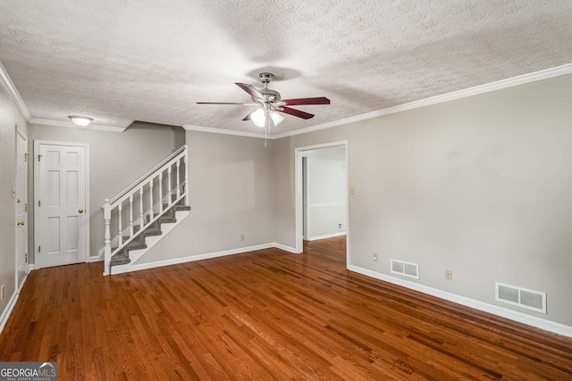 1320 Pinyon Pl, Lawrenceville, GA 30043 - unfurnished living room with baseboards, visible vents, a ceiling fan, and wood finished floors