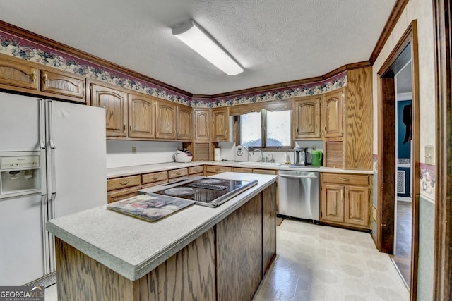 5800 S Richland Creek Rd, Buford, GA 30518 - kitchen with white fridge with ice dispenser, light countertops, stainless steel dishwasher, and a sink