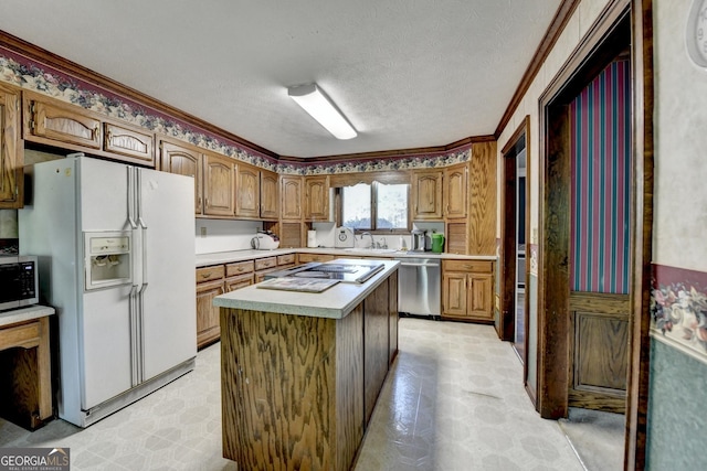 5800 S Richland Creek Rd, Buford, GA 30518 - kitchen with brown cabinets, light countertops, crown molding, a center island, and appliances with stainless steel finishes