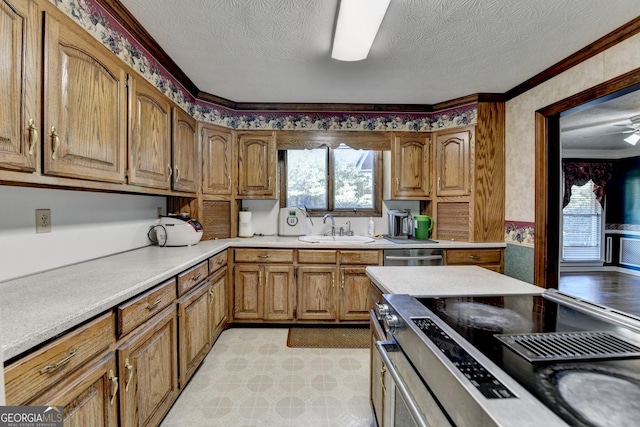 5800 S Richland Creek Rd, Buford, GA 30518 - kitchen featuring brown cabinets, light countertops, stainless steel appliances, and a sink