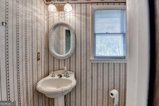 5800 S Richland Creek Rd, Buford, GA 30518 - bathroom featuring wallpapered walls and a sink