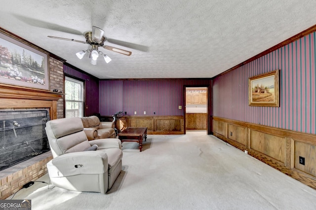 5800 S Richland Creek Rd, Buford, GA 30518 - living area featuring a fireplace, a textured ceiling, crown molding, and ceiling fan
