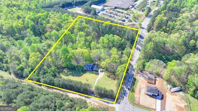 5800 S Richland Creek Rd, Buford, GA 30518 - drone / aerial view featuring a view of trees