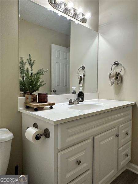 6630 Crystal Cove Trl, Gainesville, GA 30506 - half bath with toilet and vanity