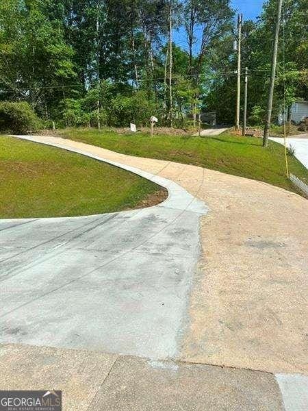 6630 Crystal Cove Trl, Gainesville, GA 30506 - view of community with a lawn