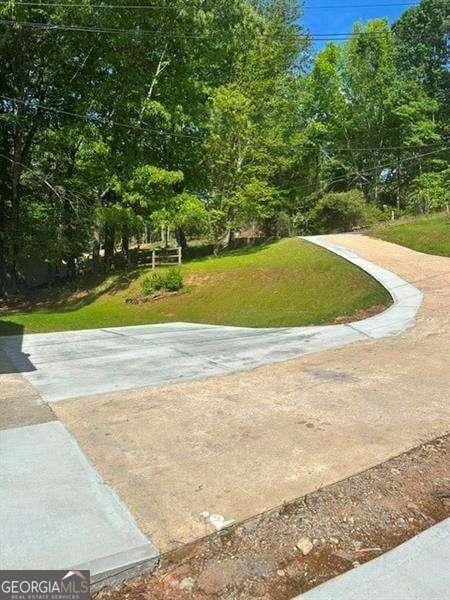 6630 Crystal Cove Trl, Gainesville, GA 30506 - view of home's community featuring a lawn