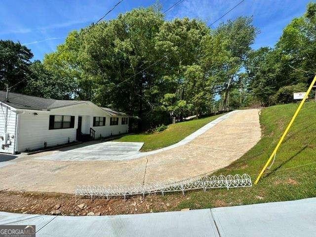 6630 Crystal Cove Trl, Gainesville, GA 30506 - exterior space featuring a yard