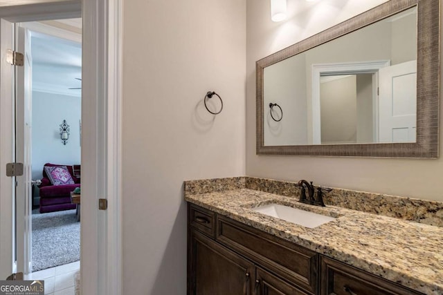 bathroom with vanity and crown molding