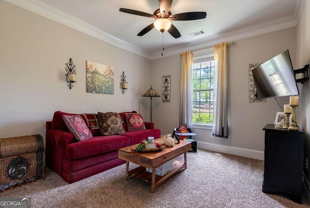 carpeted living area featuring baseboards, a ceiling fan, visible vents, and ornamental molding