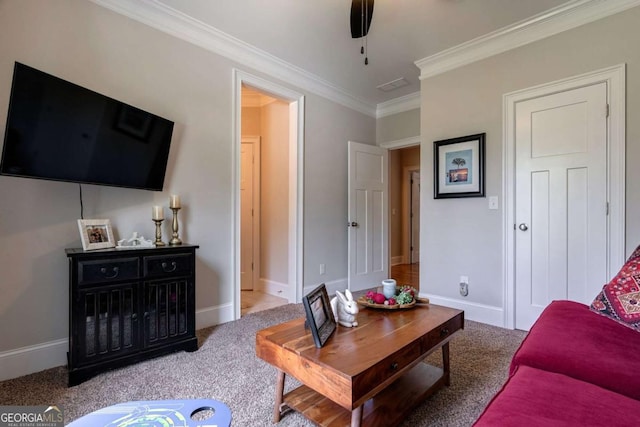 carpeted living area featuring baseboards and crown molding