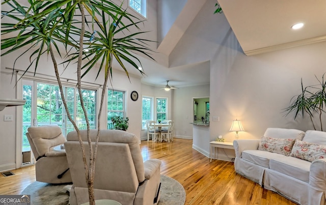 327 Kissimmee Trl, Cornelia, GA 30531 - living room with wood finished floors, ornamental molding, baseboards, and a ceiling fan