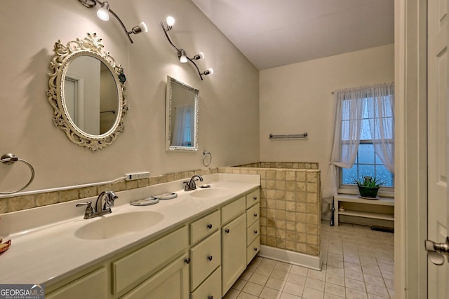 327 Kissimmee Trl, Cornelia, GA 30531 - full bathroom featuring tile patterned floors, double vanity, and a wainscoted wall