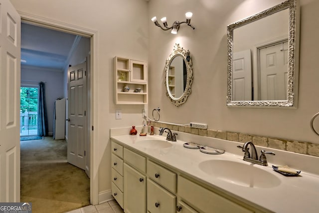 327 Kissimmee Trl, Cornelia, GA 30531 - bathroom featuring double vanity, tile patterned flooring, crown molding, and baseboards