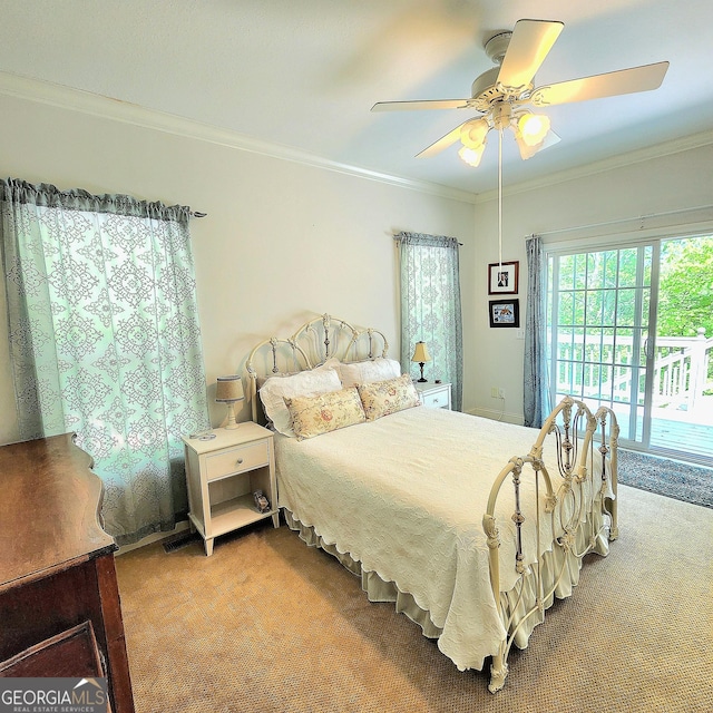 bedroom featuring access to outside, carpet flooring, and ornamental molding
