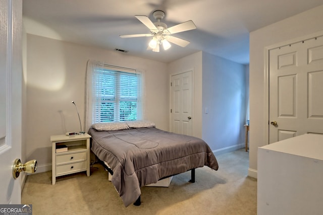 327 Kissimmee Trl, Cornelia, GA 30531 - bedroom with light colored carpet, baseboards, and ceiling fan