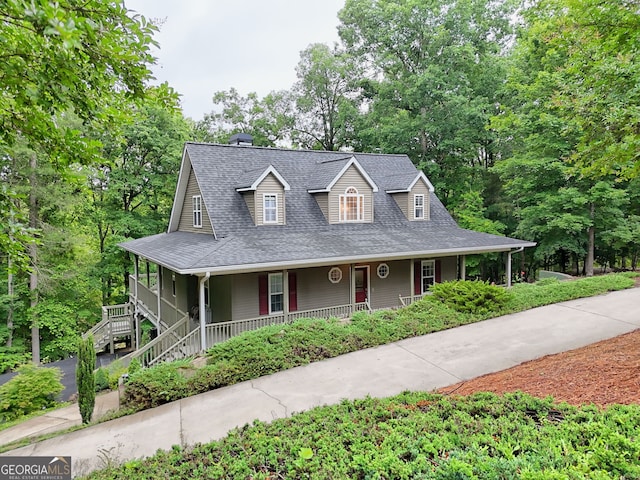 327 Kissimmee Trl, Cornelia, GA 30531 - farmhouse inspired home with covered porch, a shingled roof, and view of scattered trees