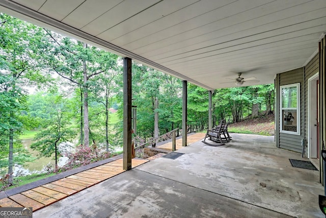 327 Kissimmee Trl, Cornelia, GA 30531 - view of patio / terrace with a ceiling fan and view of wooded area