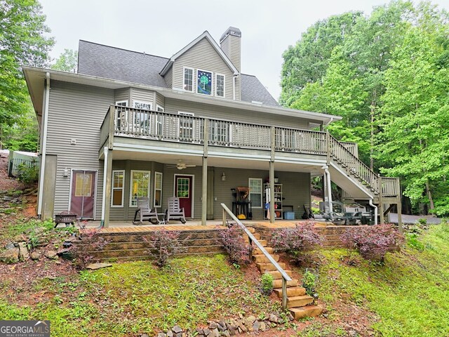 327 Kissimmee Trl, Cornelia, GA 30531 - back of house with stairway, a chimney, a deck, a ceiling fan, and a patio