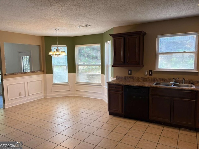 4234 Winston Cir, Atlanta, GA 30349 - kitchen featuring plenty of natural light, dishwasher, a sink, and a chandelier