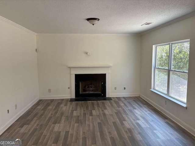 4234 Winston Cir, Atlanta, GA 30349 - unfurnished living room featuring a fireplace with flush hearth, wood finished floors, visible vents, ornamental molding, and a textured ceiling