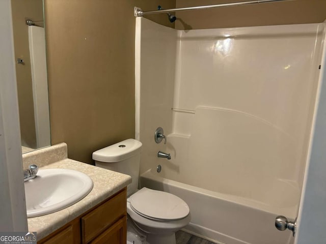4234 Winston Cir, Atlanta, GA 30349 - bathroom featuring toilet, vanity, and bathing tub / shower combination