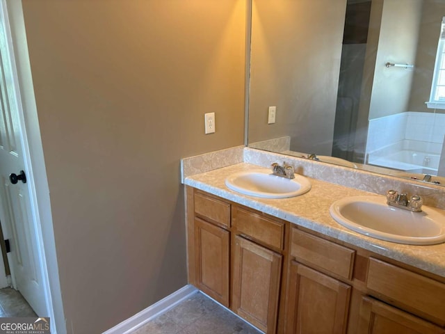 4234 Winston Cir, Atlanta, GA 30349 - full bathroom featuring double vanity, a garden tub, and a sink