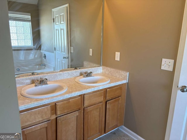 4234 Winston Cir, Atlanta, GA 30349 - bathroom with a bath, double vanity, and a sink