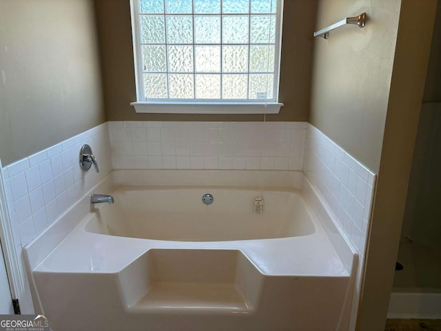 4234 Winston Cir, Atlanta, GA 30349 - bathroom featuring a bath